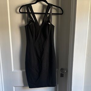Cynthia Steffe sexy LBD with 100% leather strappy  detail. Lined.